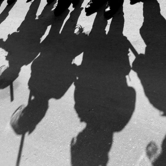 Shadows of policemen