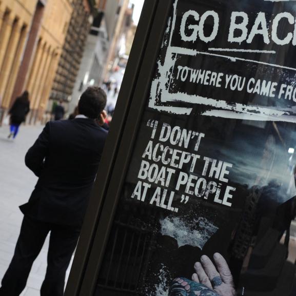 A poster promoting an Australian television documentary "Go back to where you came from"