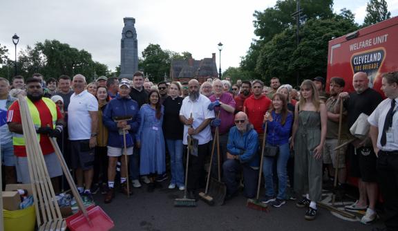 Multiple people stand in solidarity in Middlesborough